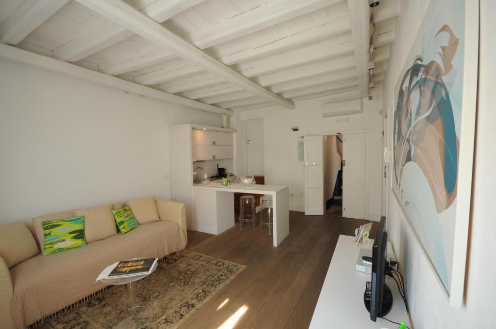 Televízia a/alebo spoločenská miestnosť v ubytovaní B&B Suite Home Trani
