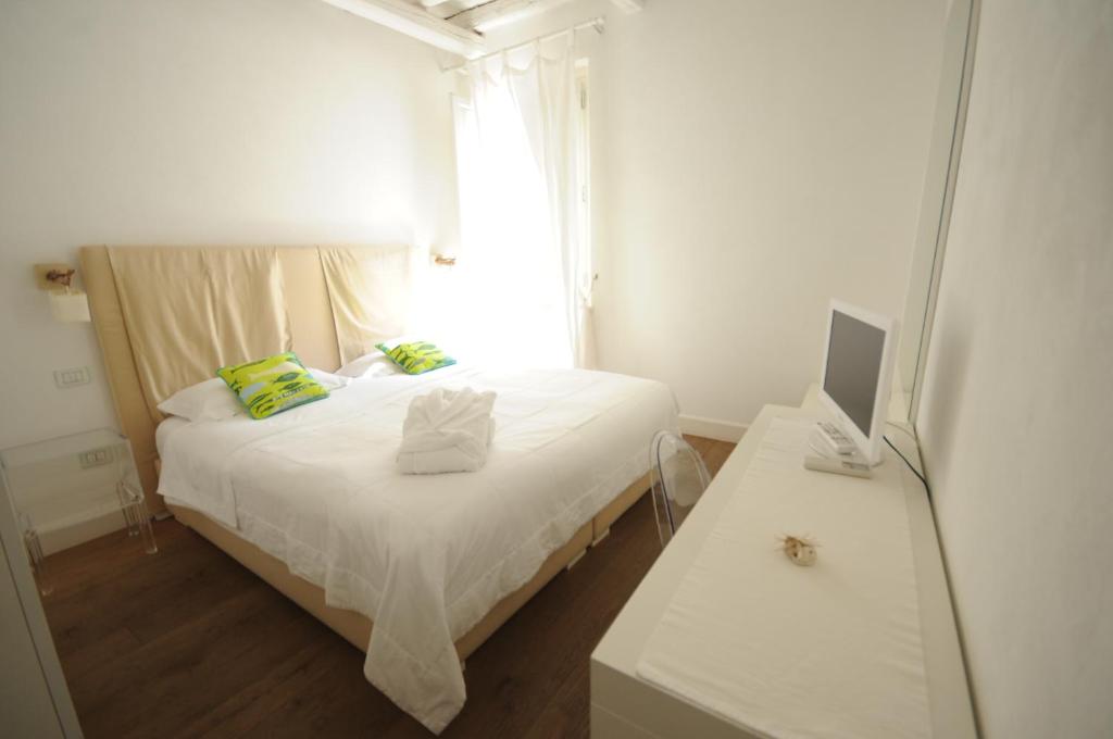 Posteľ alebo postele v izbe v ubytovaní B&B Suite Home Trani