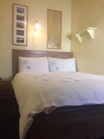 Postel nebo postele na pokoji v ubytování Badjao B&B