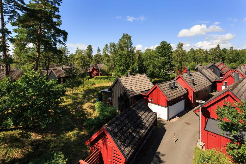 an overhead view of a village with red roofs at Klitterbyn Lodge in Ängelholm
