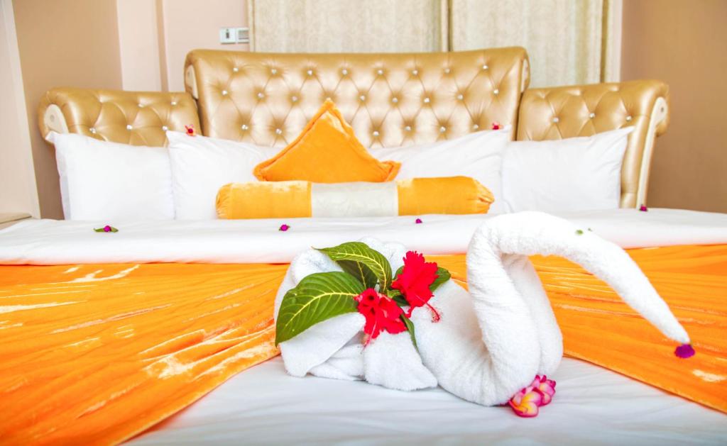 Postel nebo postele na pokoji v ubytování Dreams Hotel Zanzibar