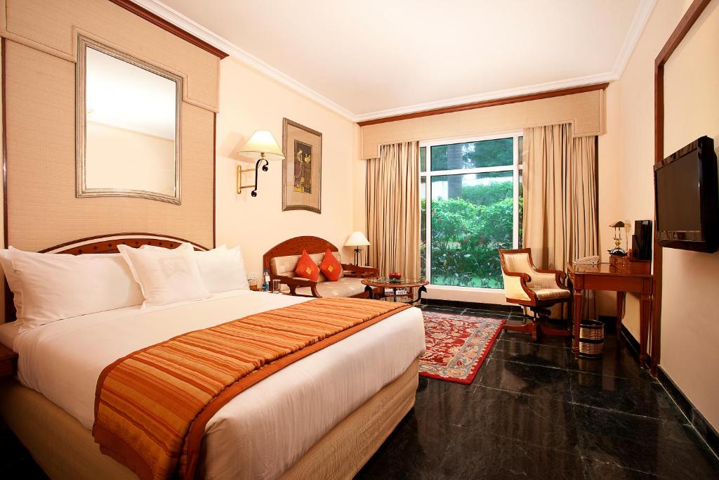 Postel nebo postele na pokoji v ubytování Welcomhotel by ITC Hotels, Alkapuri, Vadodara