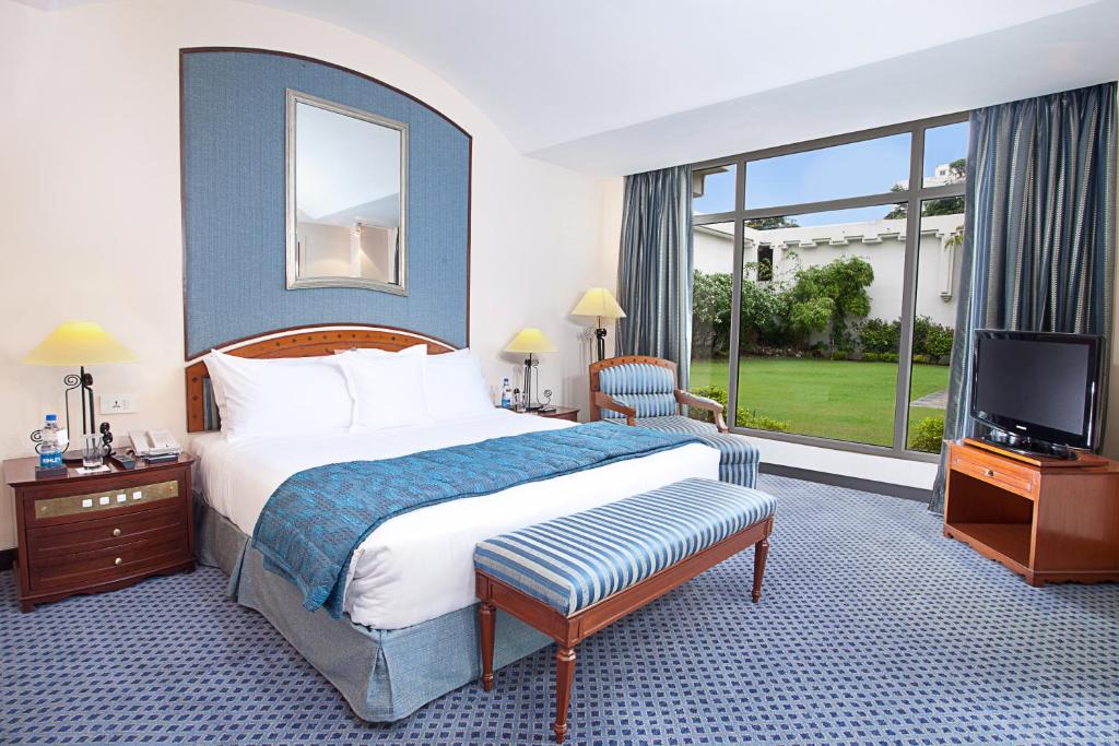 Postel nebo postele na pokoji v ubytování Welcomhotel by ITC Hotels, Alkapuri, Vadodara