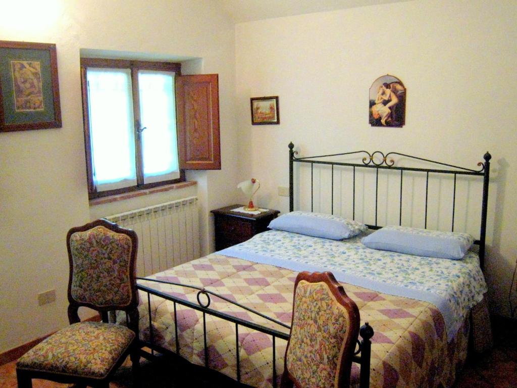 Posteľ alebo postele v izbe v ubytovaní Cottage with private garden in Tuscany