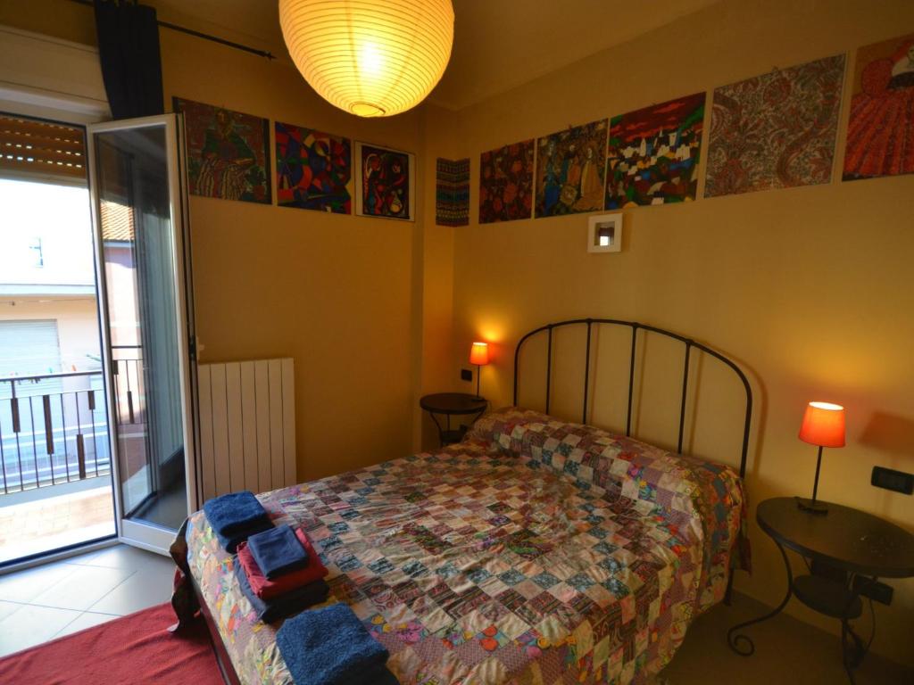 A bed or beds in a room at Belvilla by OYO An apartment near the sea