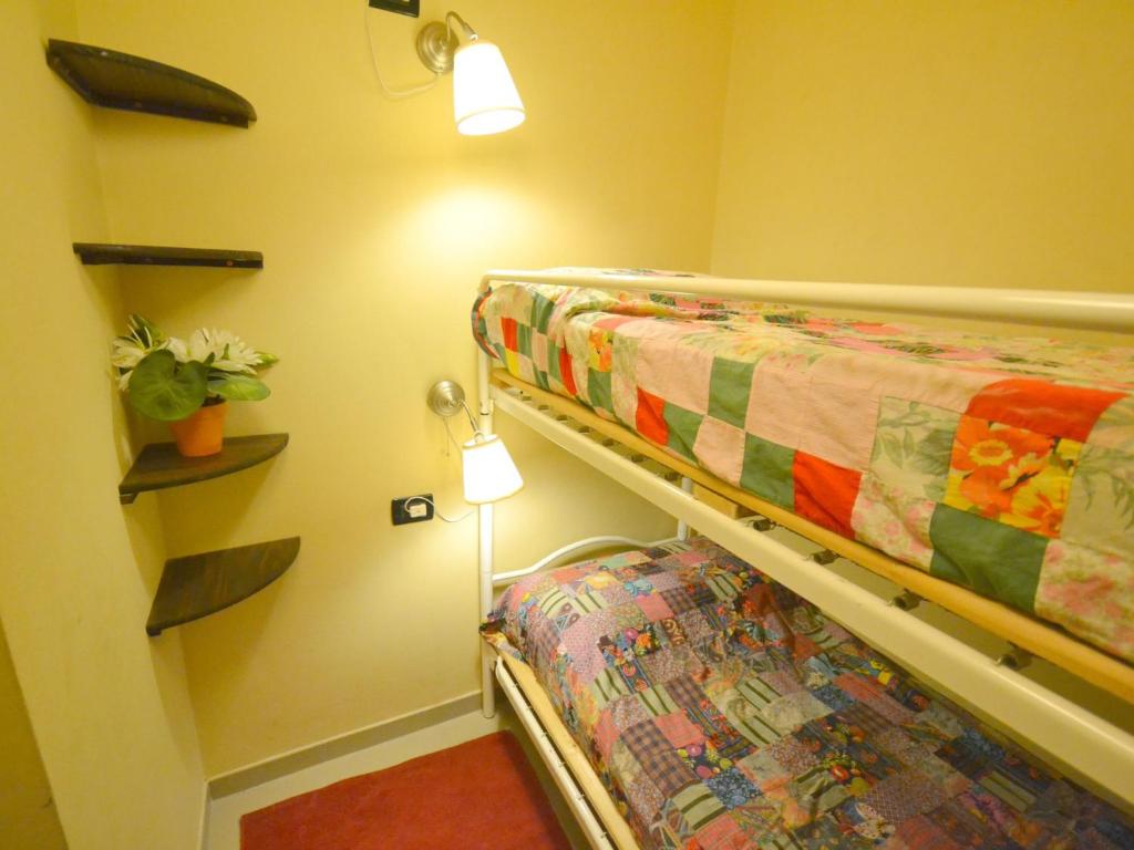 A bed or beds in a room at Belvilla by OYO An apartment near the sea