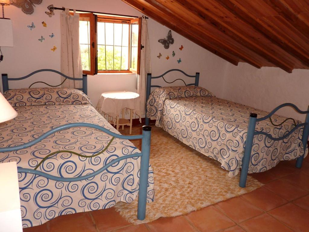 Postel nebo postele na pokoji v ubytování Cottage in Villanueva near El Torcal