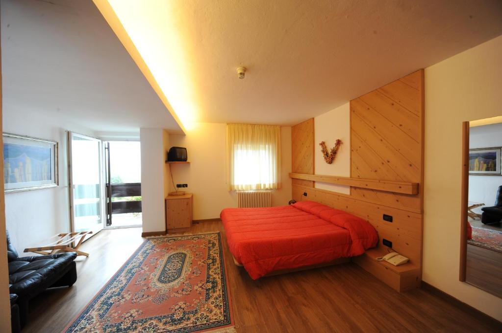 Postel nebo postele na pokoji v ubytování Hotel Compet