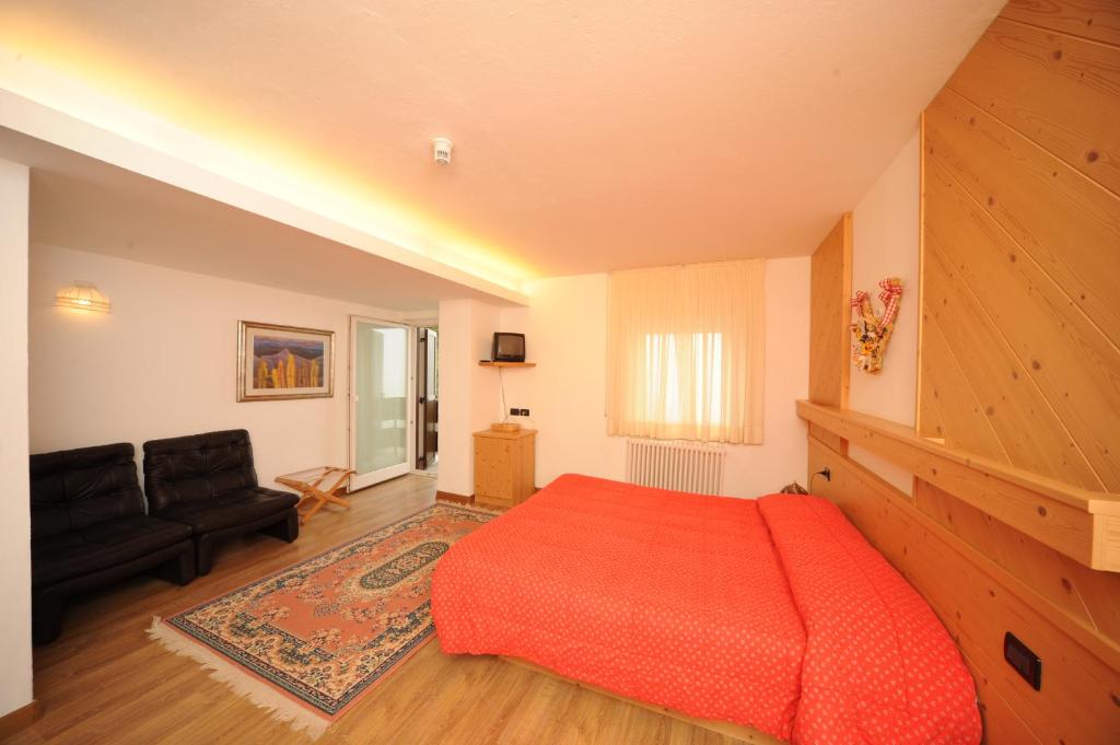 Postel nebo postele na pokoji v ubytování Hotel Compet