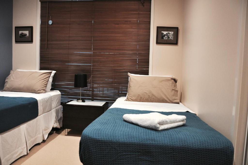 Postel nebo postele na pokoji v ubytování TL Warmest Homestay