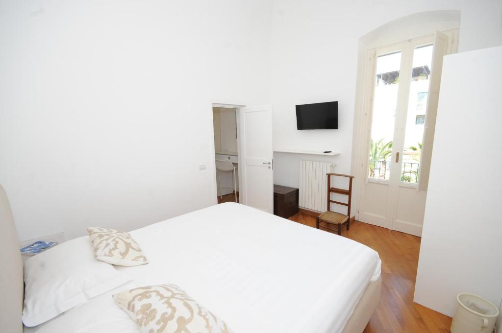 Postel nebo postele na pokoji v ubytování Maremaris B&B