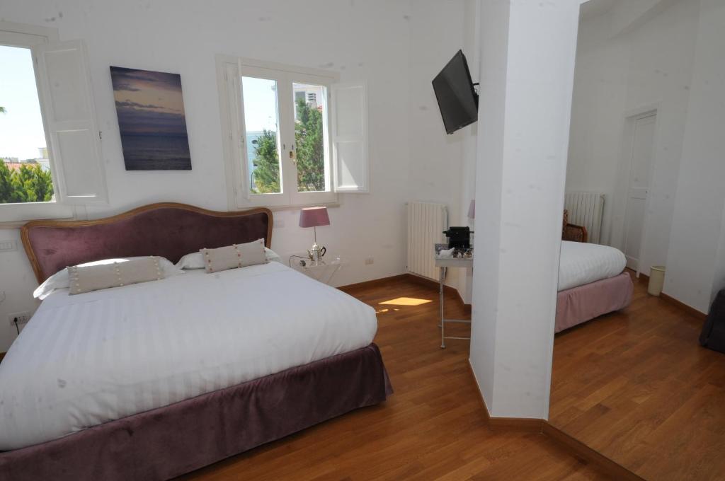 Postel nebo postele na pokoji v ubytování Maremaris B&B