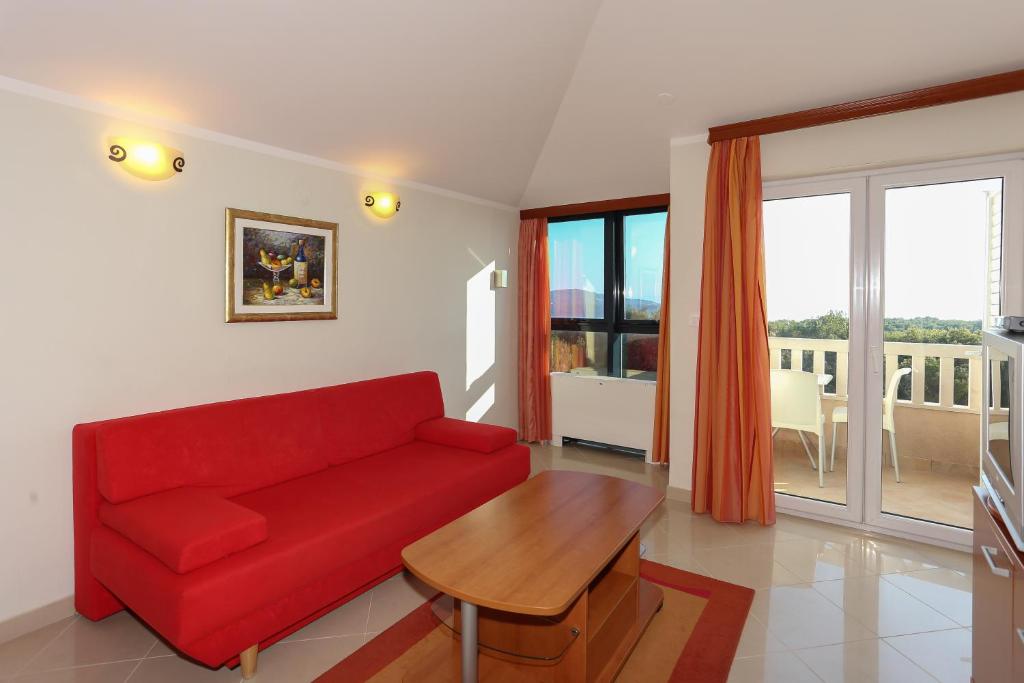 Posedenie v ubytovaní Apartments and Rooms Astoria
