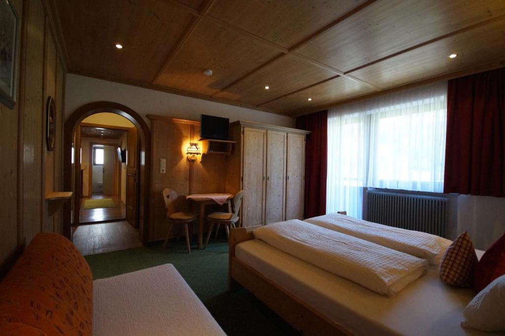 Posteľ alebo postele v izbe v ubytovaní Appartement Gästehaus Aloisia