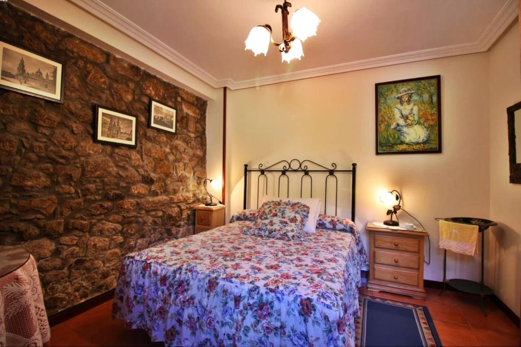 Łóżko lub łóżka w pokoju w obiekcie Casa Cunha