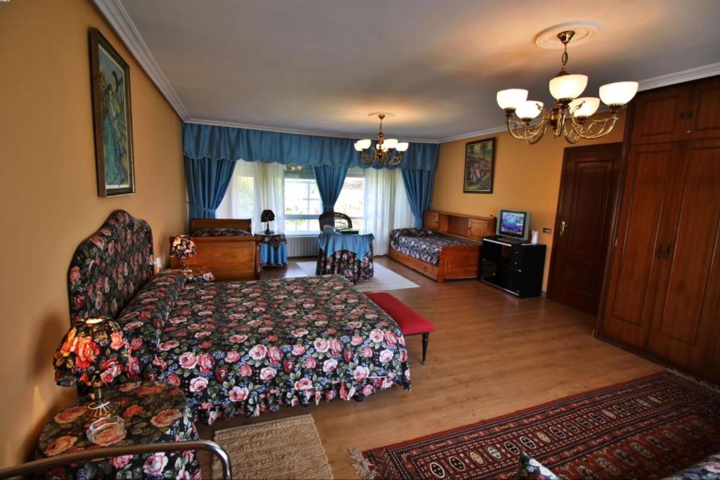 Łóżko lub łóżka w pokoju w obiekcie Casa Cunha