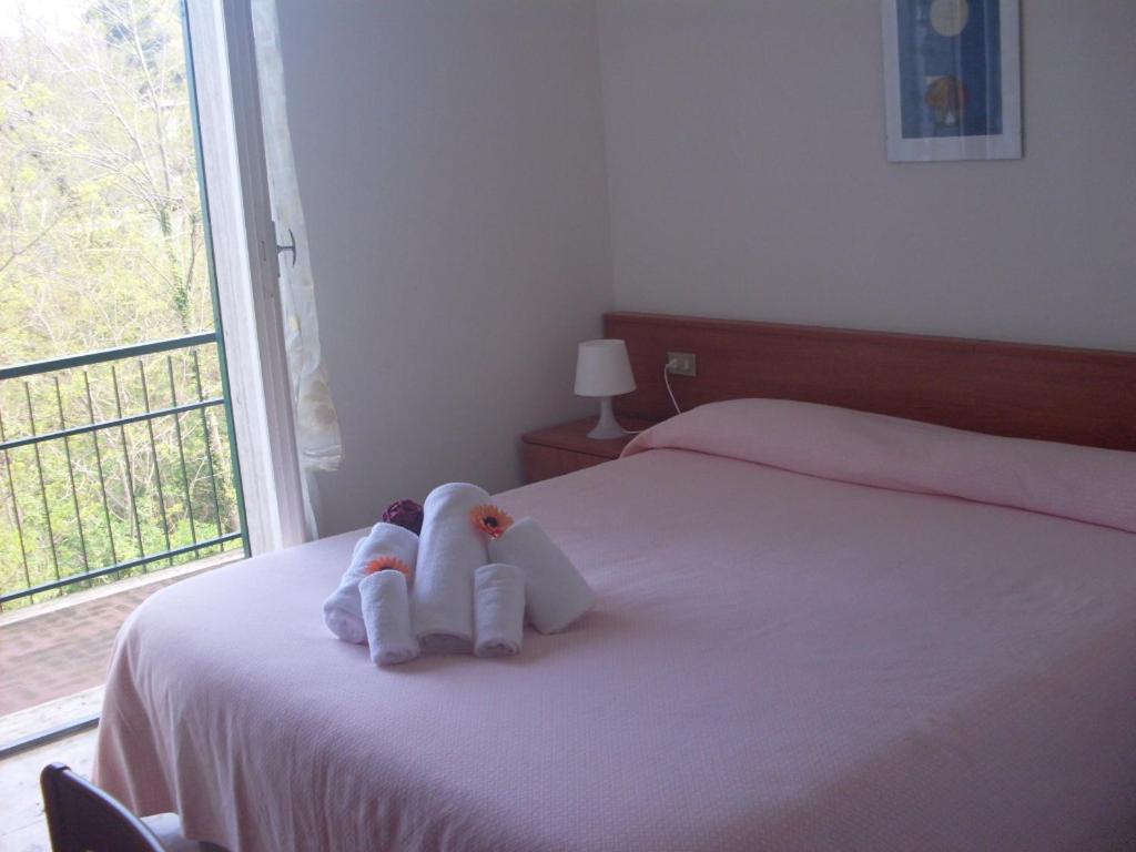 Postel nebo postele na pokoji v ubytování Hotel Silvia Framura - Cinque Terre