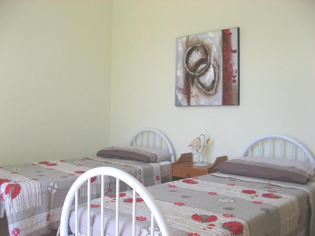 Posteľ alebo postele v izbe v ubytovaní Casa Bruno B&B