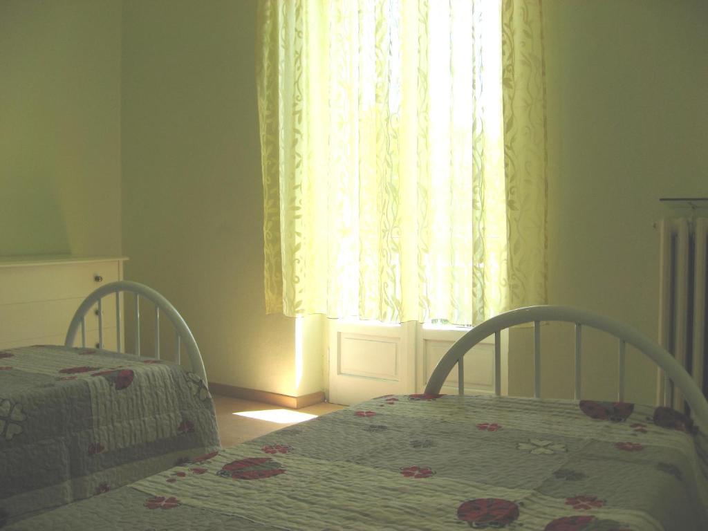Posteľ alebo postele v izbe v ubytovaní Casa Bruno B&B