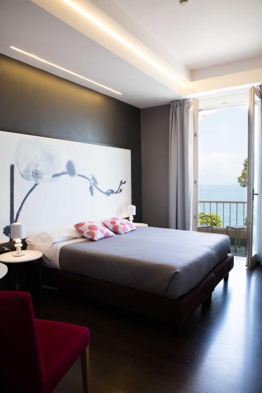Postelja oz. postelje v sobi nastanitve Hotel Vittorio