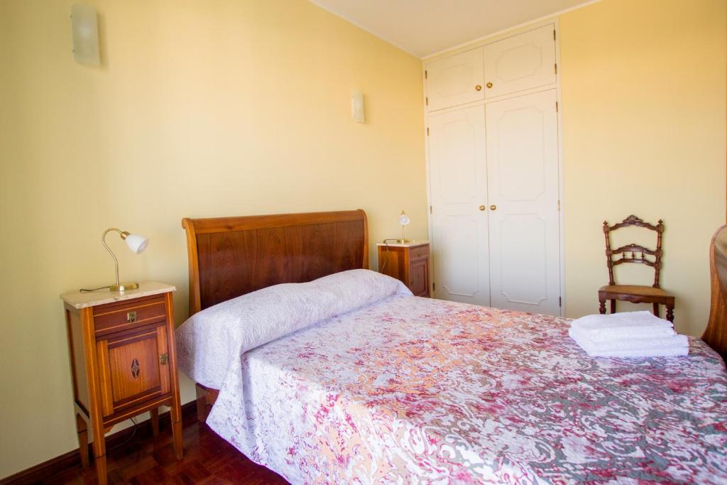 Postel nebo postele na pokoji v ubytování CASA BELAVISTA - BAÍA