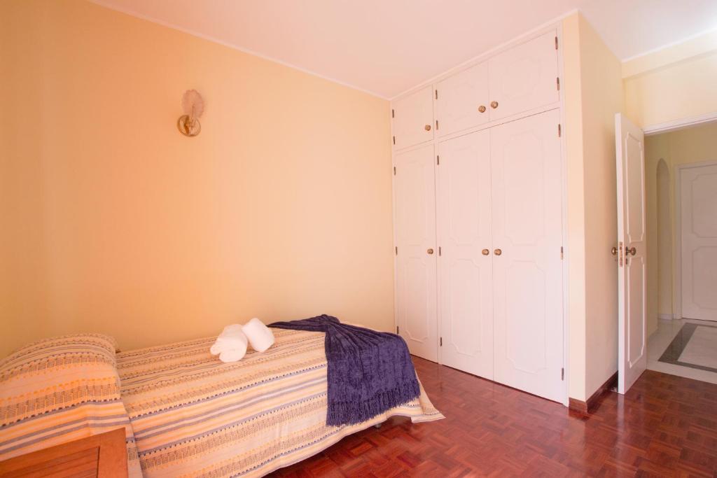 Postel nebo postele na pokoji v ubytování CASA BELAVISTA - BAÍA