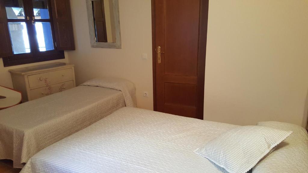 Postel nebo postele na pokoji v ubytování Casa Sampietro
