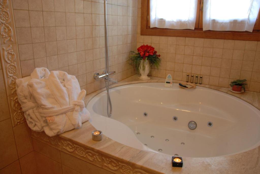 Koupelna v ubytování Hotel Selba d'Ansils