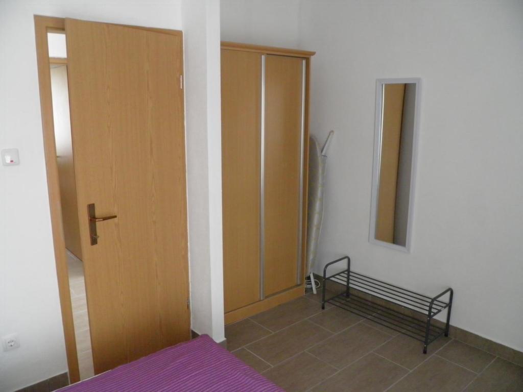 Posteľ alebo postele v izbe v ubytovaní Apartman Radošić