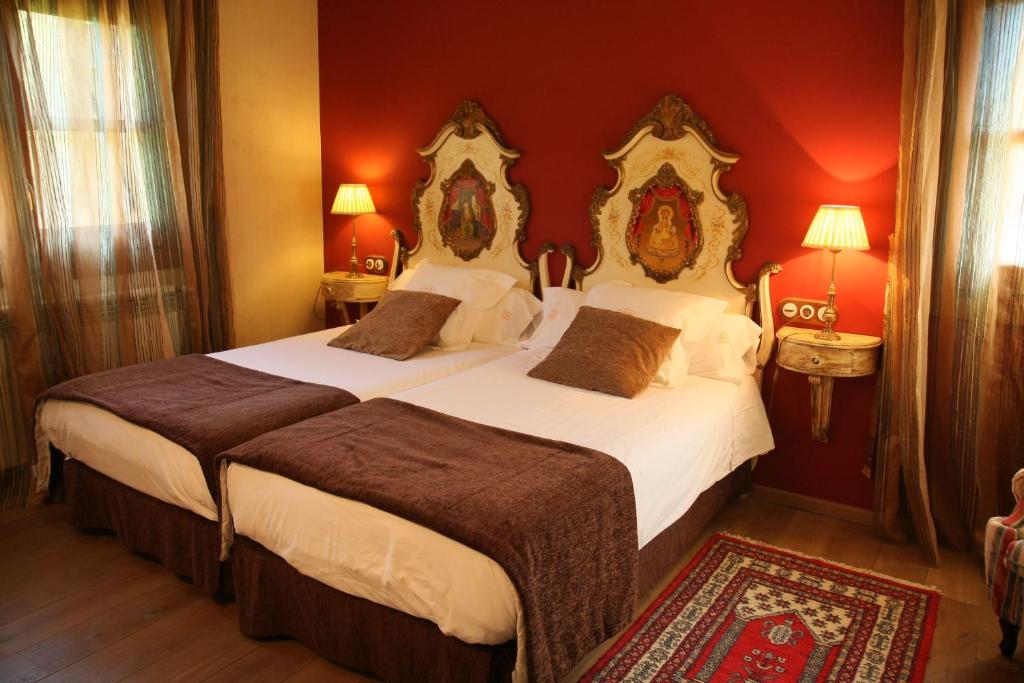 Postel nebo postele na pokoji v ubytování Hotel Selba d'Ansils