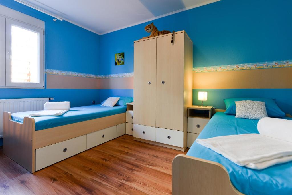 Posteľ alebo postele v izbe v ubytovaní Villa Šima- luxury apartment with private pool