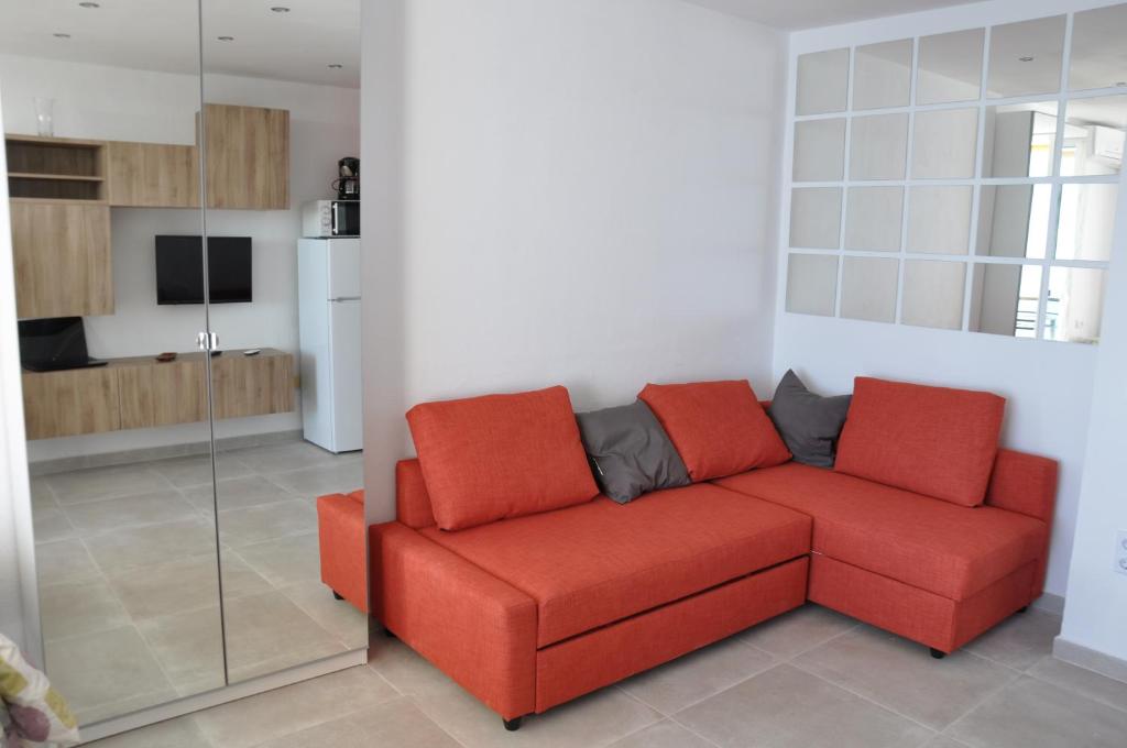TV a/nebo společenská místnost v ubytování Studio Sea View Terrace