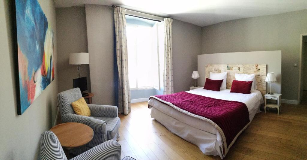 Voodi või voodid majutusasutuse L'Observance Bed & Breakfast toas