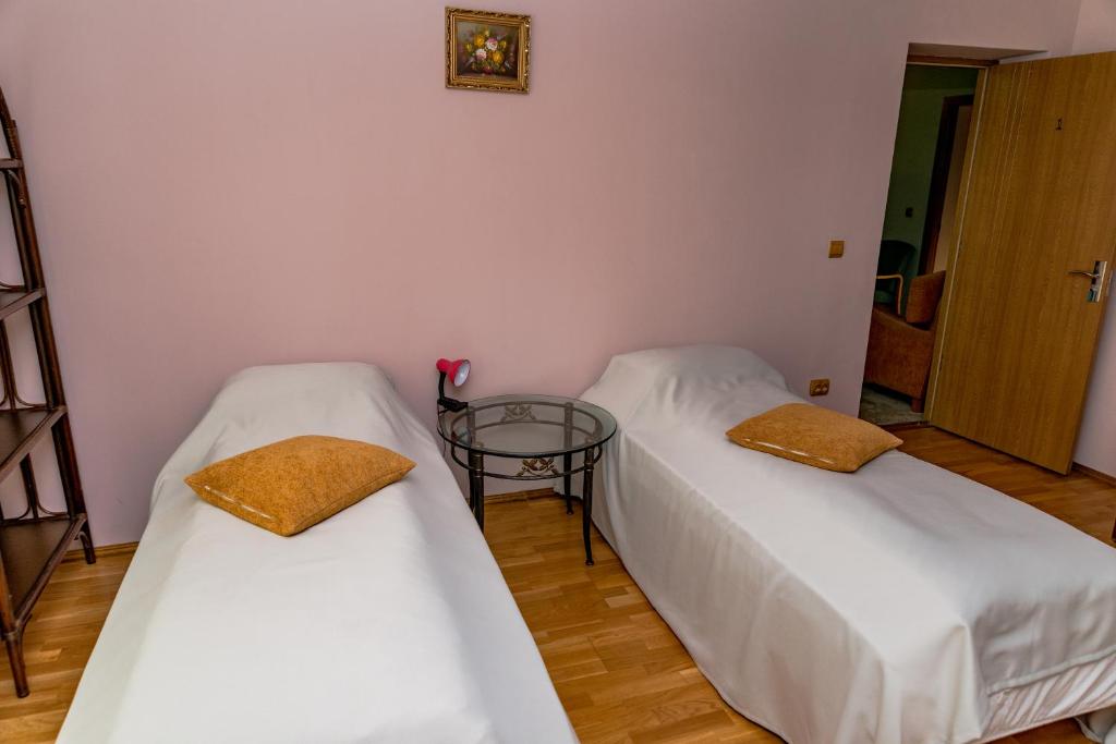 Postel nebo postele na pokoji v ubytování Noring Guest House