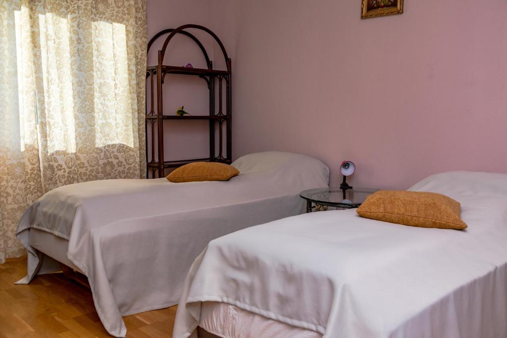 Postel nebo postele na pokoji v ubytování Noring Guest House