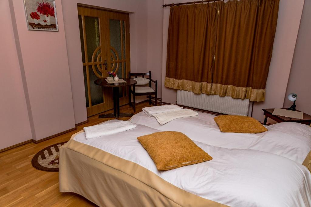 Postel nebo postele na pokoji v ubytování Noring Guest House