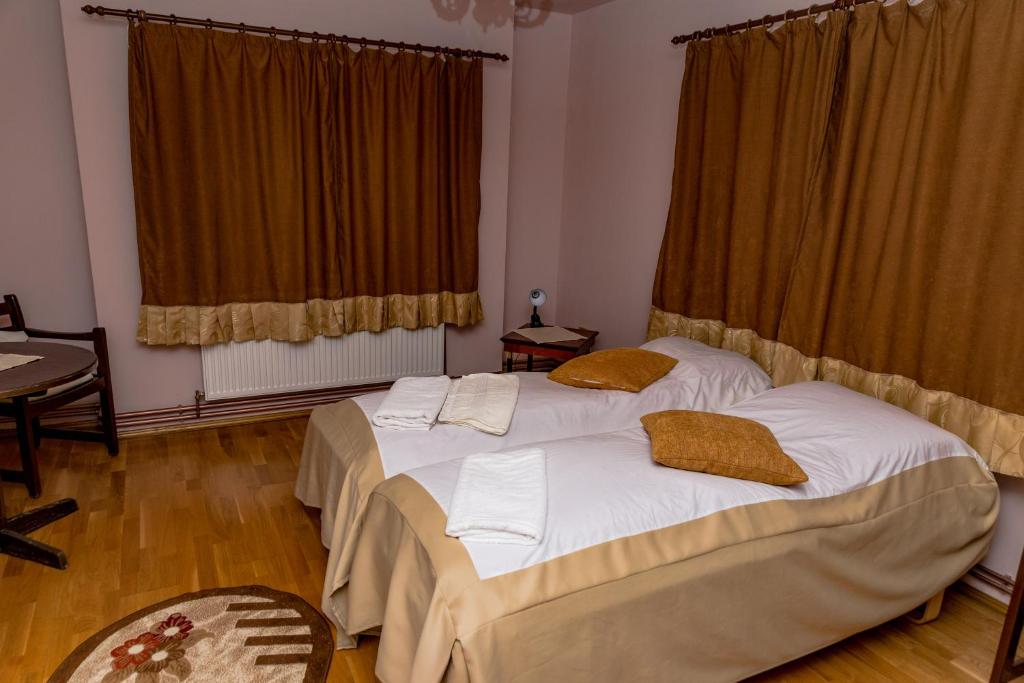 Postel nebo postele na pokoji v ubytování Noring Guest House