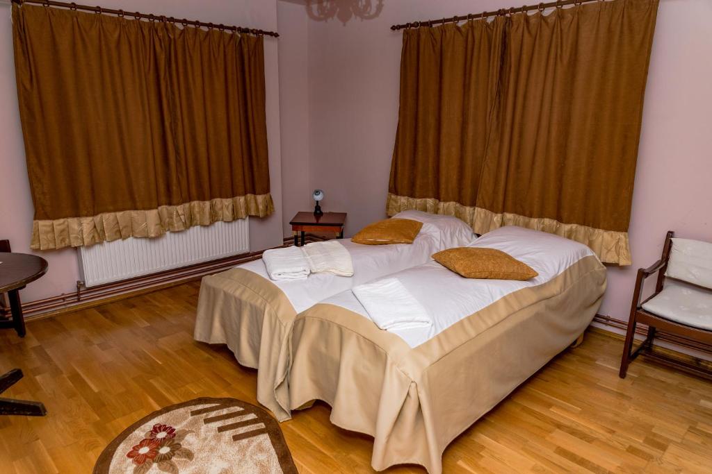 Postel nebo postele na pokoji v ubytování Noring Guest House