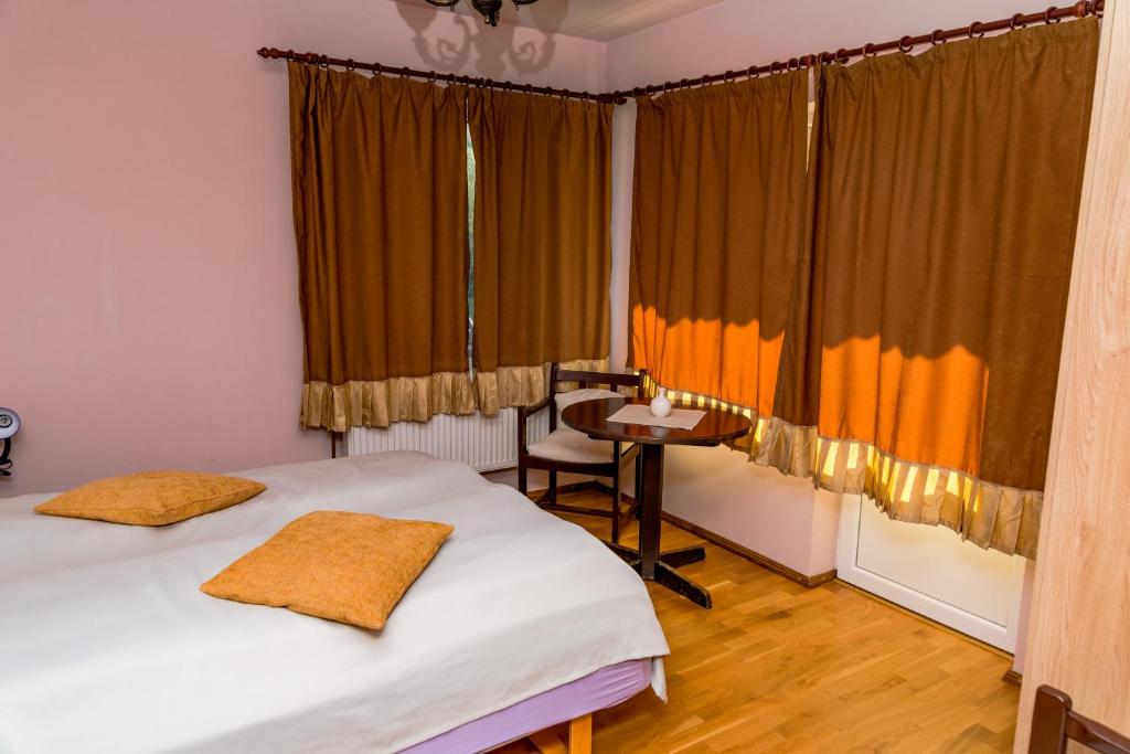 Postel nebo postele na pokoji v ubytování Noring Guest House