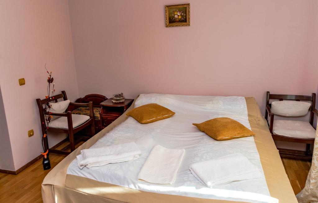 Postel nebo postele na pokoji v ubytování Noring Guest House