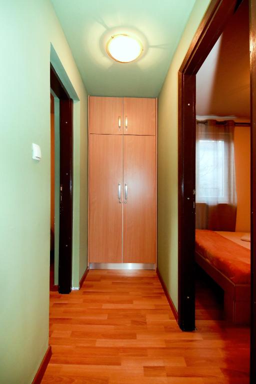 Posteľ alebo postele v izbe v ubytovaní tiho's apartments