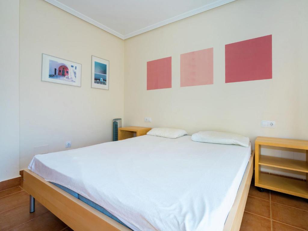 Postel nebo postele na pokoji v ubytování Belvilla by OYO Villa Mosa Claire