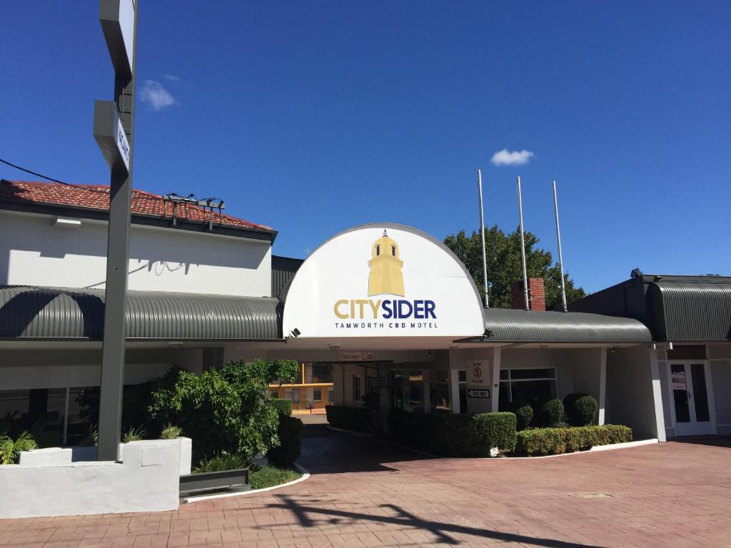 a cityoster building with a sign that reads cityoster at City Sider Motor Inn in Tamworth