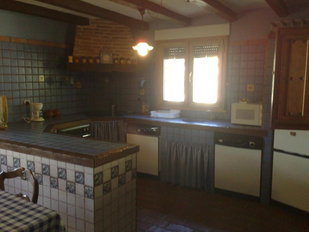 Una cocina o zona de cocina en Complejo Rural El Marañal