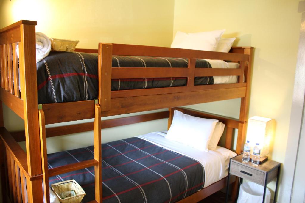 Postel nebo postele na pokoji v ubytování The Tasmanian Inn