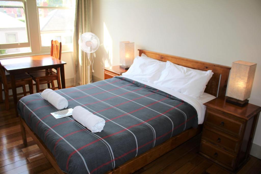 Postel nebo postele na pokoji v ubytování The Tasmanian Inn