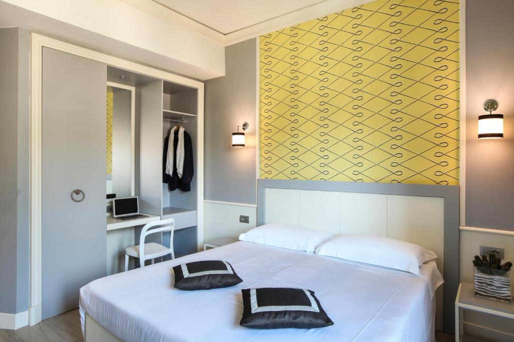 Łóżko lub łóżka w pokoju w obiekcie Hotel Golf