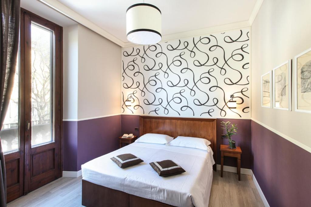 Łóżko lub łóżka w pokoju w obiekcie Hotel Golf