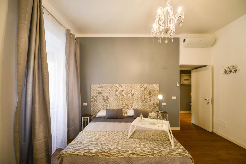 Postel nebo postele na pokoji v ubytování Casa Ferrovieri
