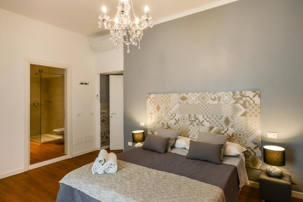 Postel nebo postele na pokoji v ubytování Casa Ferrovieri